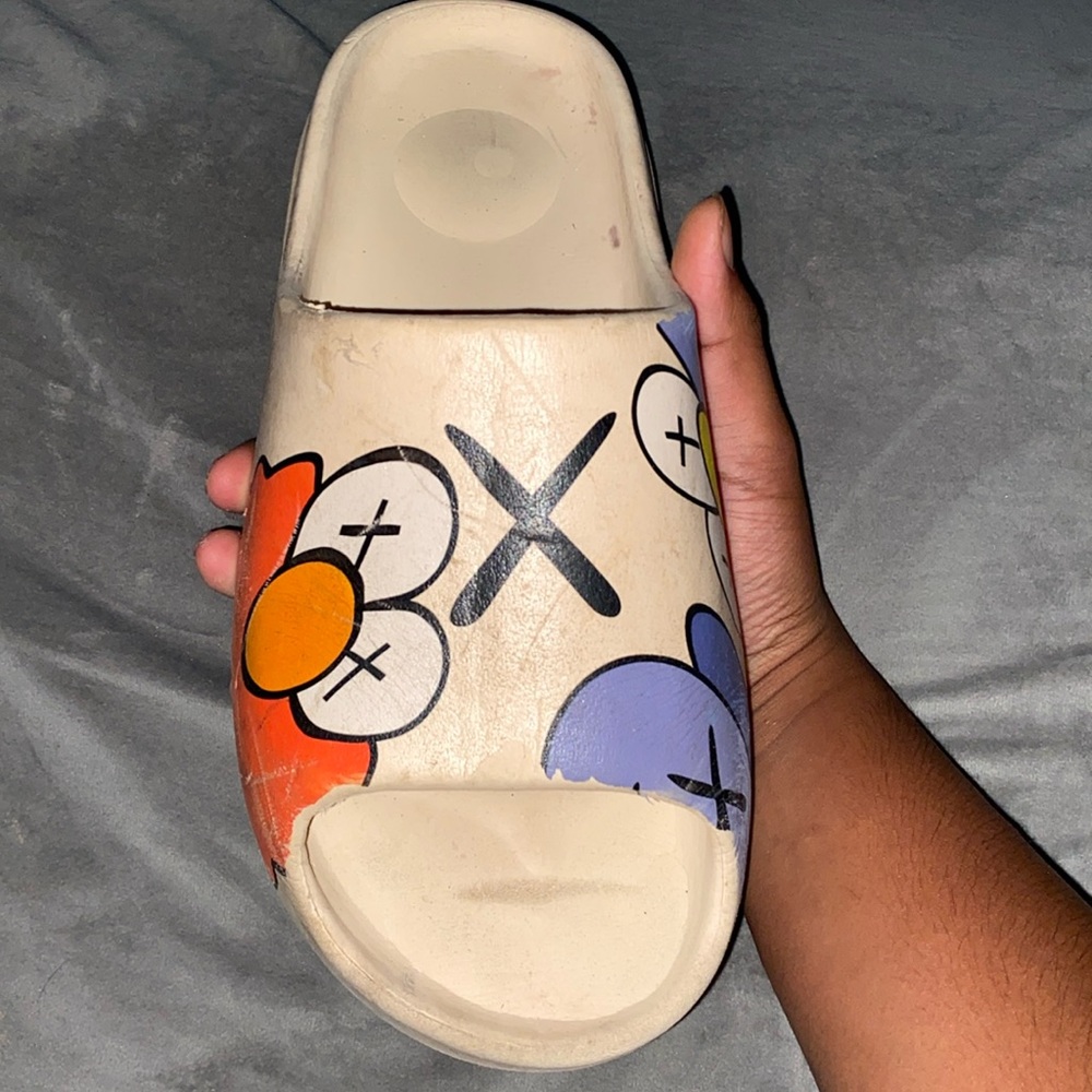 Kaws Slide.